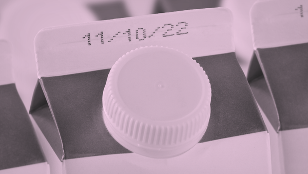 Carton of milk with an expiration date.